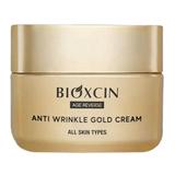 Crema Bioxcin anti-imbatranire multi-activa, imbogatita cu proteina de matase si aur de 24 Karate, 50 ml